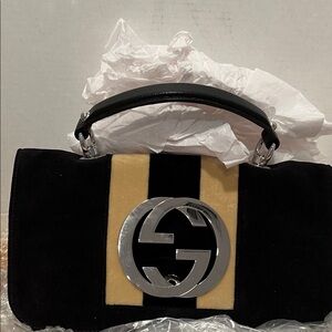 Gucci Designer Handbag
Velvet brownish huge 
 metal logo clutch leather handles